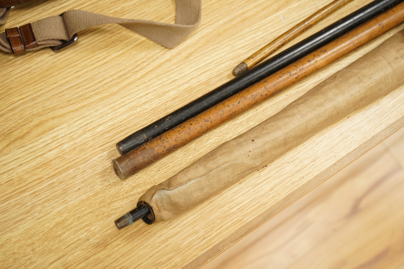 Three silver topped walking canes and a similar parasol, largest 97cm in length